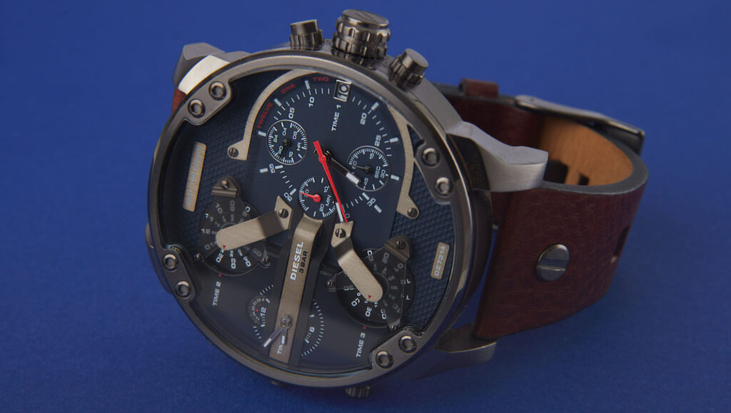 a product ecommerce photography image of a Diesel watch on a blue background